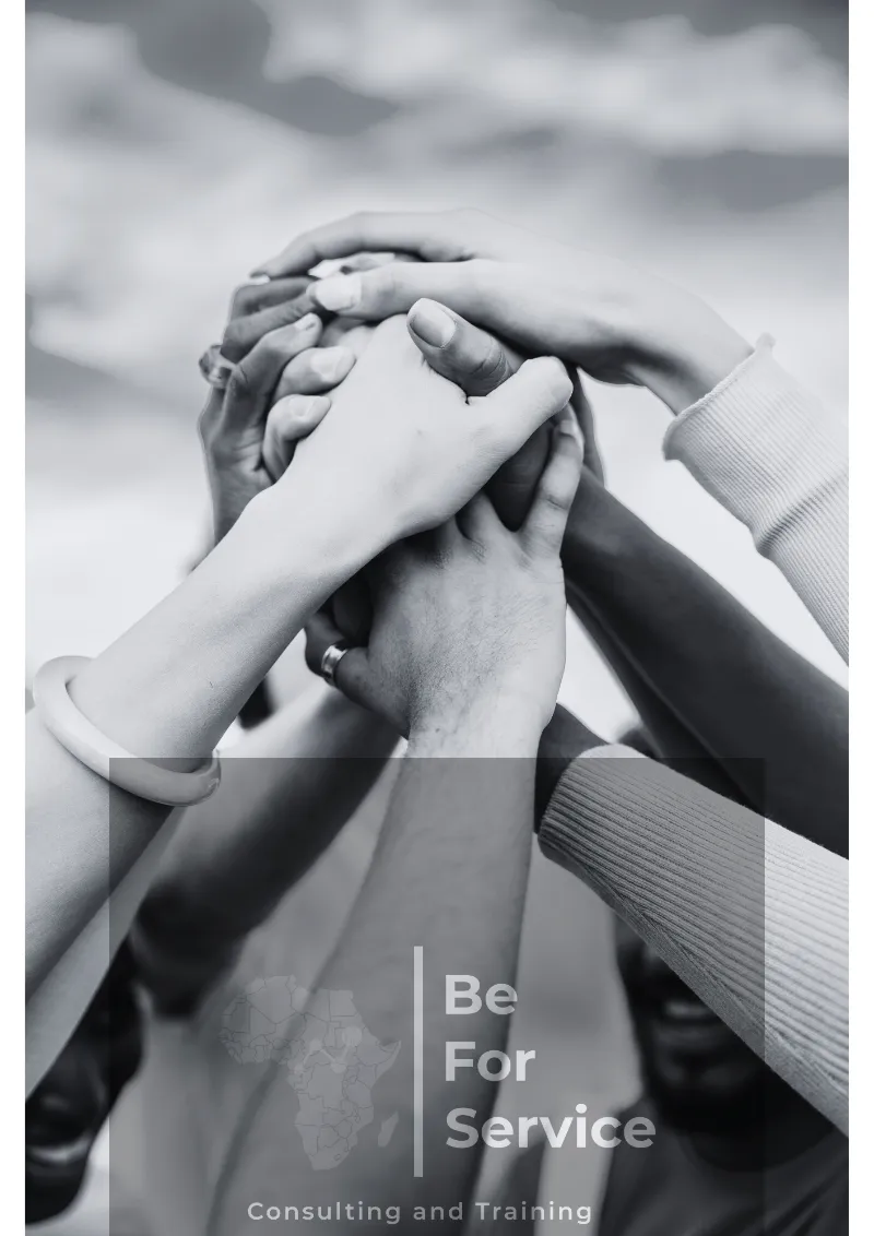 Hands joined together representing teamwork, collaboration, and people-centered business culture.